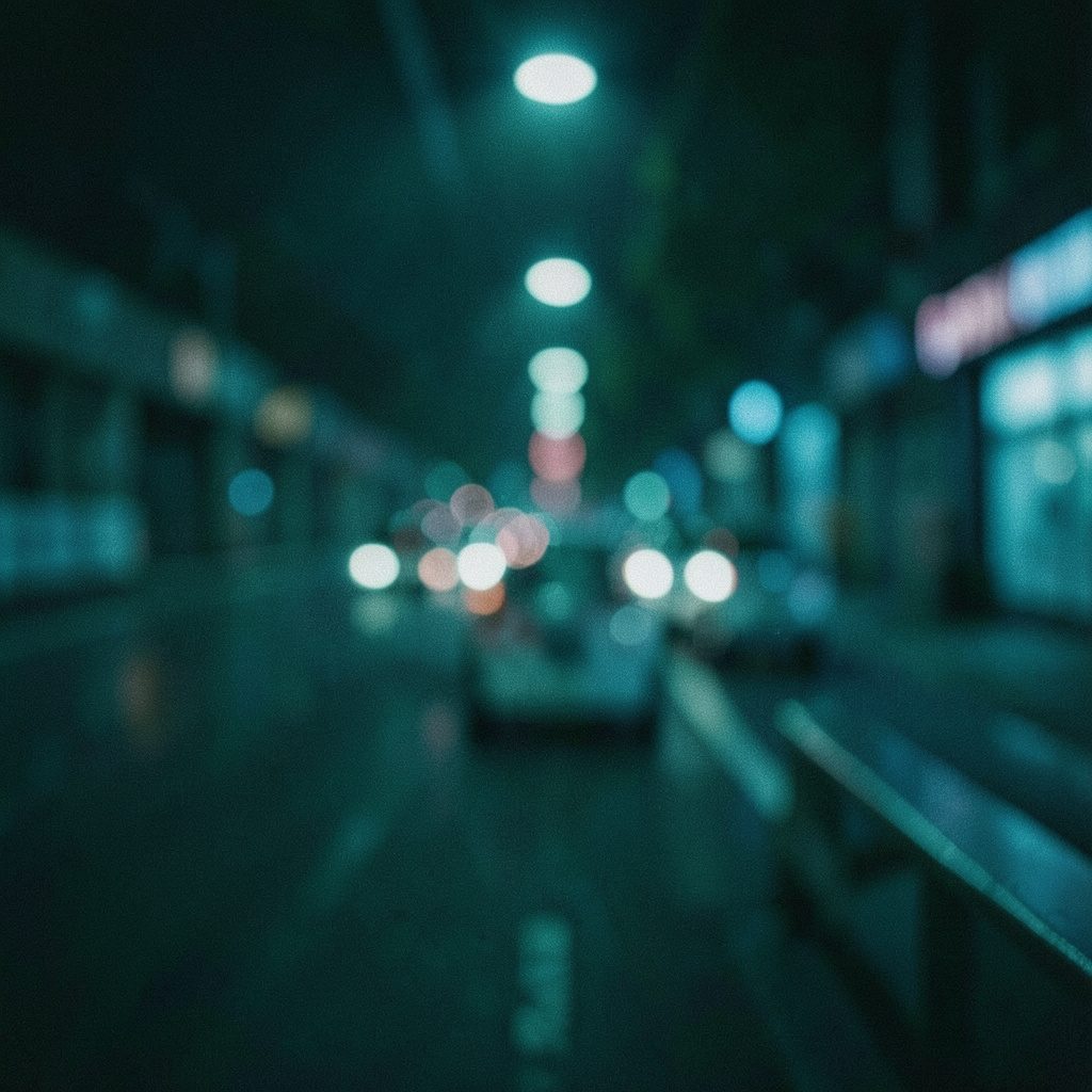 Cinematic wide frame of a smartphone on a dark desk beside a notebook, shallow depth of field, teal and slate tones, soft moody lighting